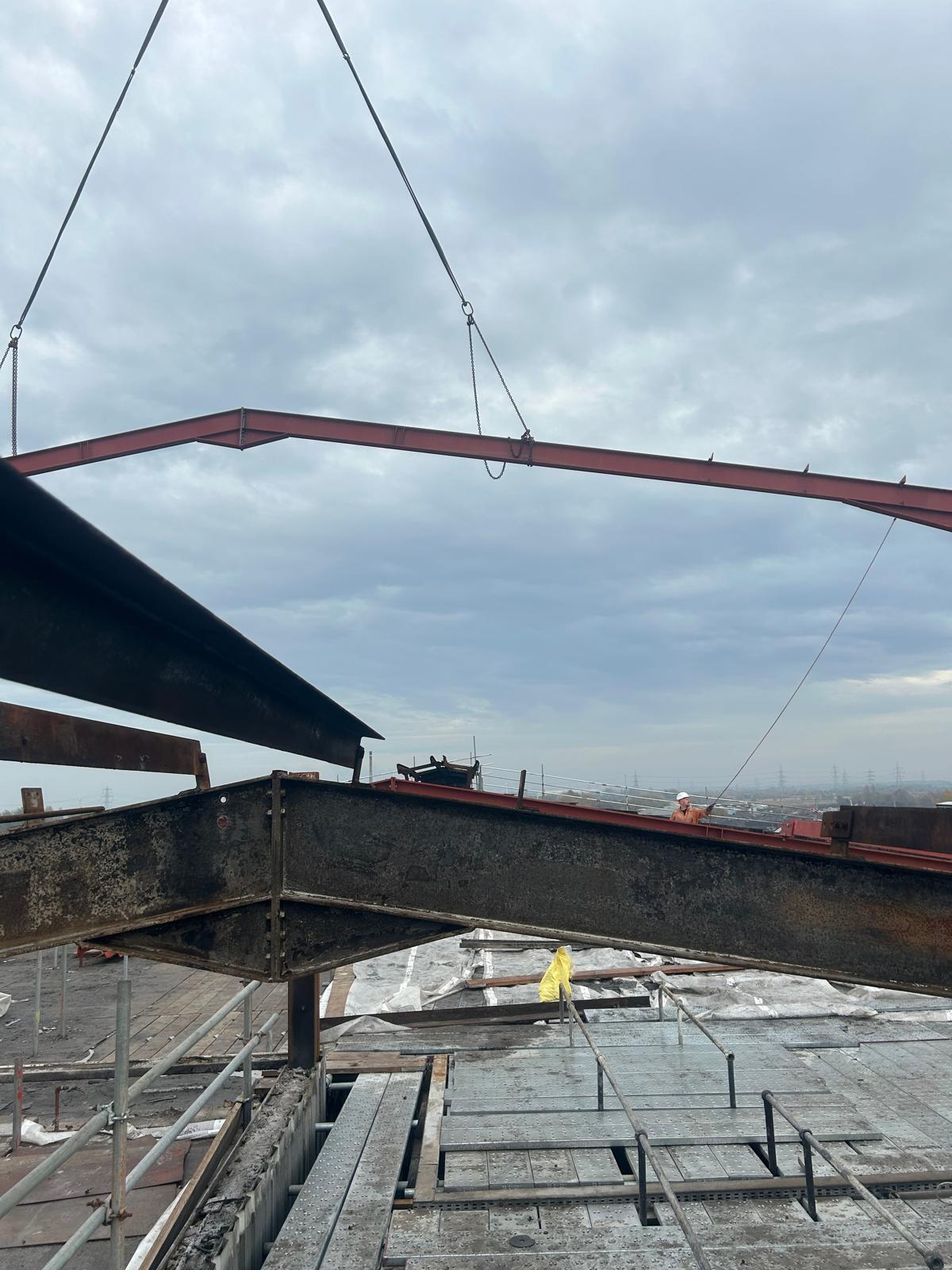 Crane-assisted structural steelwork installation